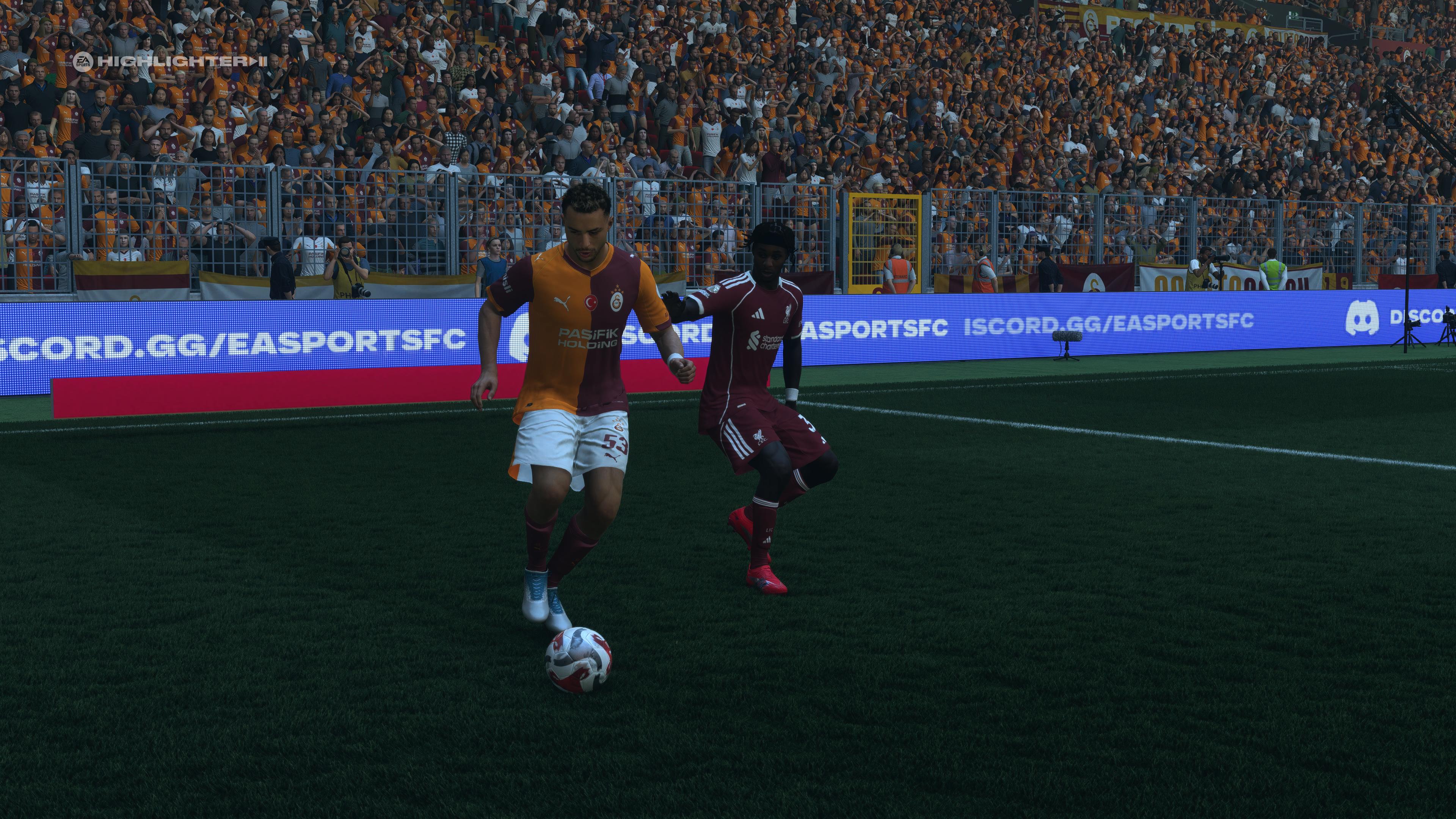 Baris Yilmaz shielding the ball from Jeremie Frimpong in EA Sports FC 26. - 4