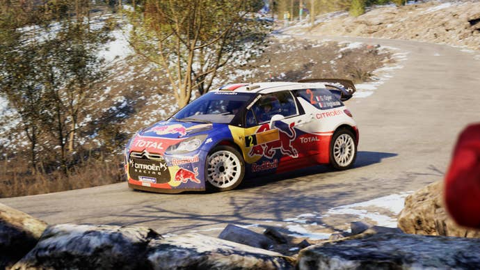 A Citroen DS3 WRC taking a corner in EA Sports WRC.