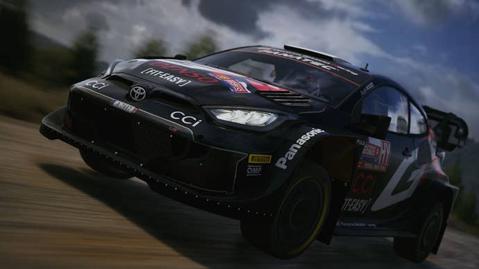 A car going fast in EA Sports WRC.