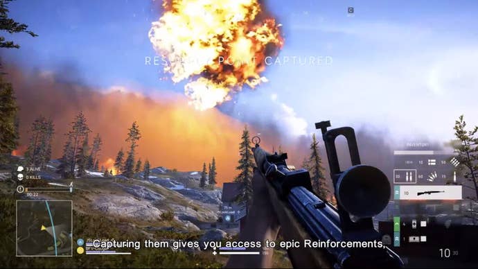 A screenshot of Battlefield 5's Firestorm mode; a solider holds a gun to the sky as a cloud of explosion and a wall of flame comes towards them.