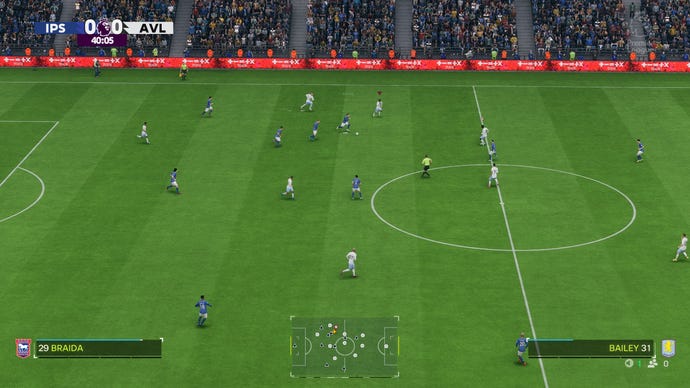 A regular view of football taking place on pitch.