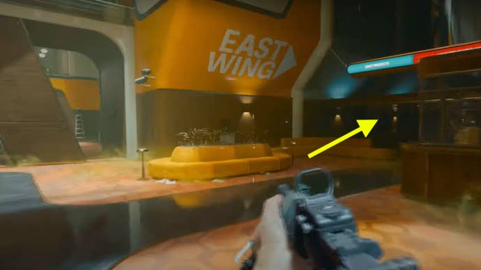 The east wing of the Black Ops 6 Emergence mission. An arrow points to the right, in the correct direction to find the safe room.