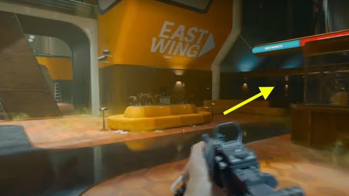 The east wing of the Black Ops 6 Emergence mission. An arrow points to the right, in the correct direction to find the safe room.
