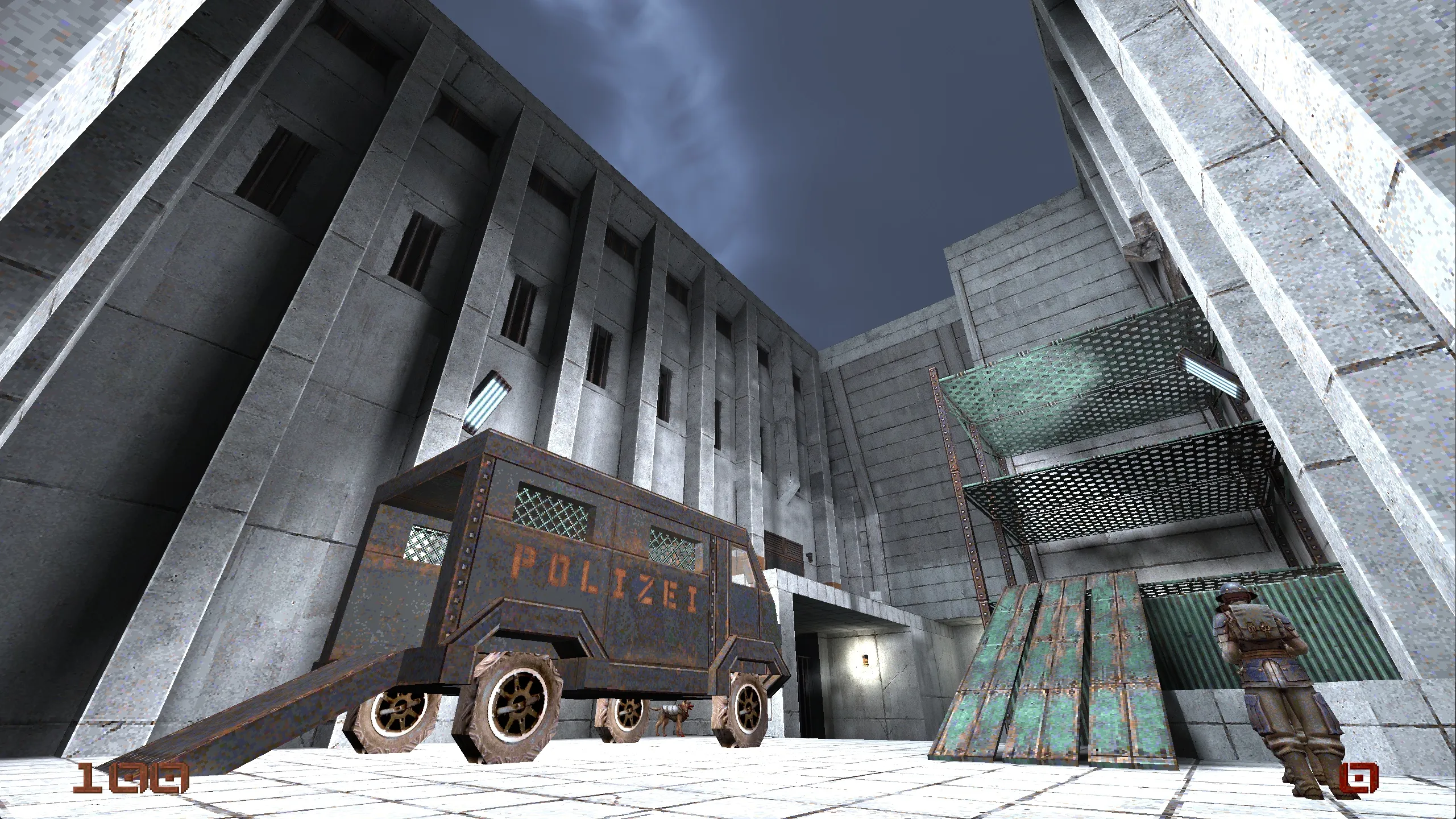 Screenshot of a Quake map made by Ed Lu showing an armoured trick outside a cold-looking grey building