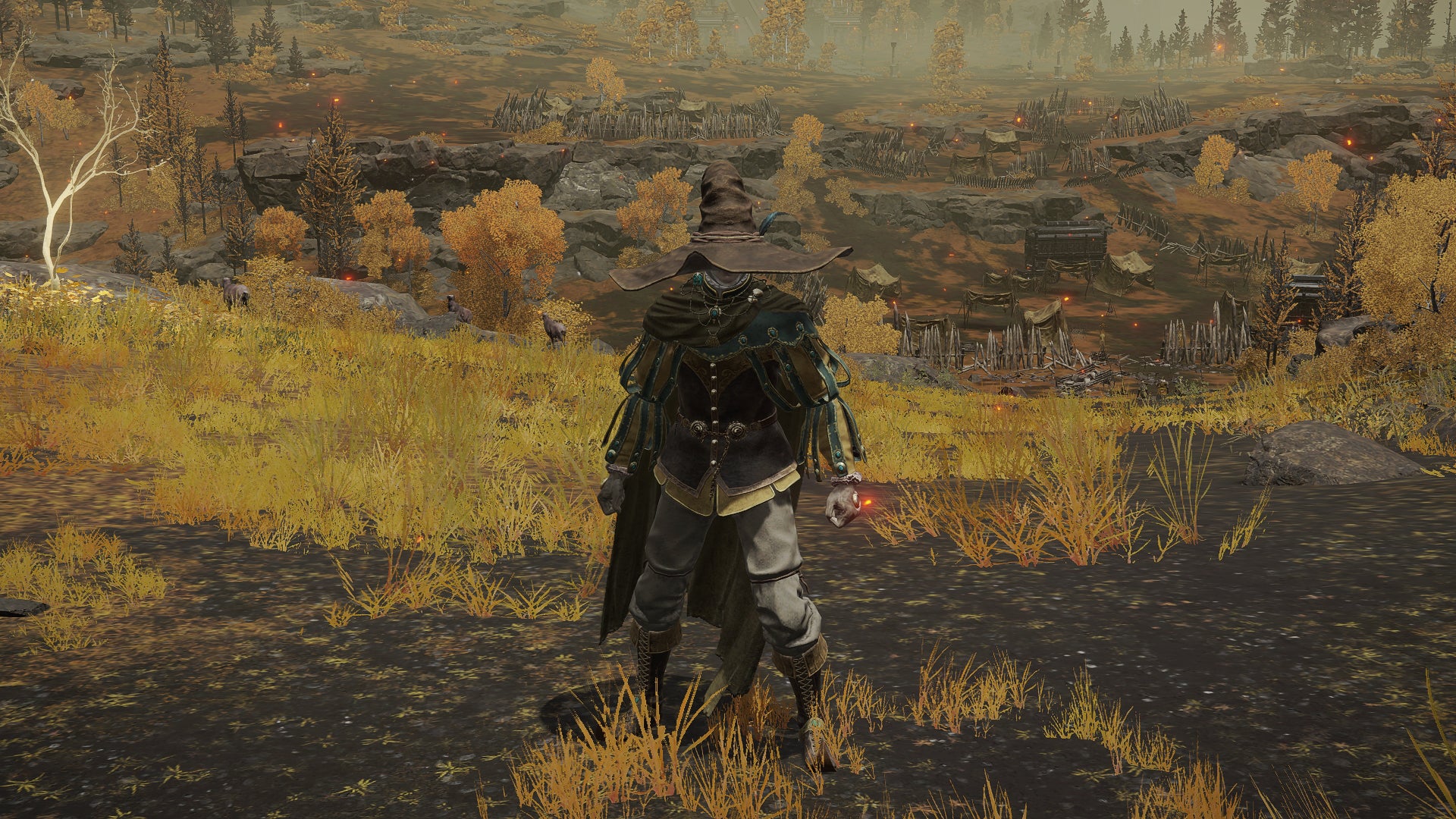 The player in Elden Ring stands in front of the camera wearing the Spellblade armour set. Behind them is a view of the Altus Plateau. - 13