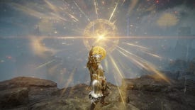 Screenshot of the Tarnished in Elden Ring raising a sword as it emits a golden glow via its applied Ashes of War.
