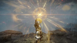 Screenshot of the Tarnished in Elden Ring raising a sword as it emits a golden glow via its applied Ashes of War.