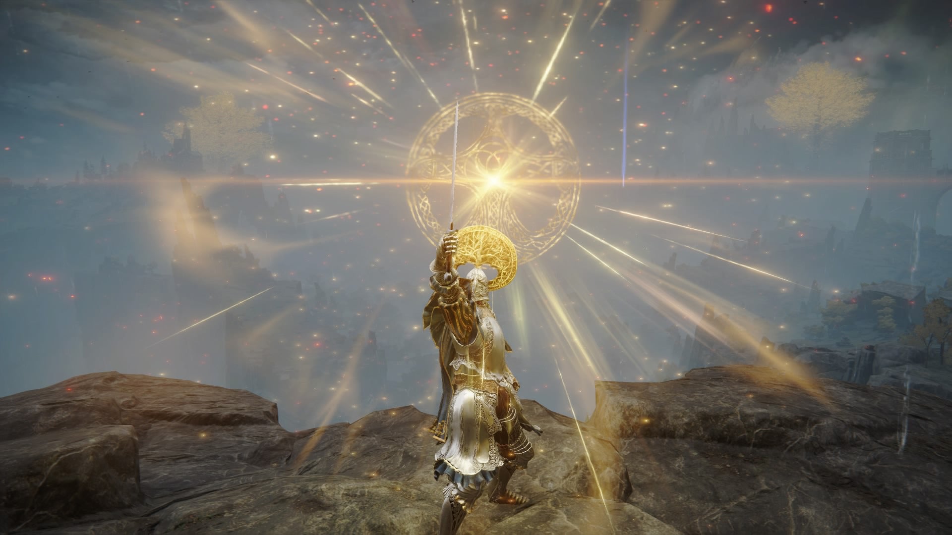 Screenshot of the Tarnished in Elden Ring raising a sword as it emits a golden glow via its applied Ashes of War. - 1