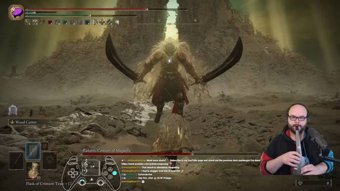 An Elden Ring boss raises his swords to either side of his body in a threatening posture, as Twitch streamer Dr Doot plays saxophone to control the on-screen protagonist.