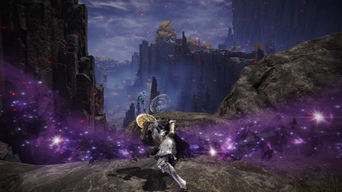 Elden Ring screenshot of the Tarnished atop a cliff, performing the Bastard’s Stars Weapon Skill.