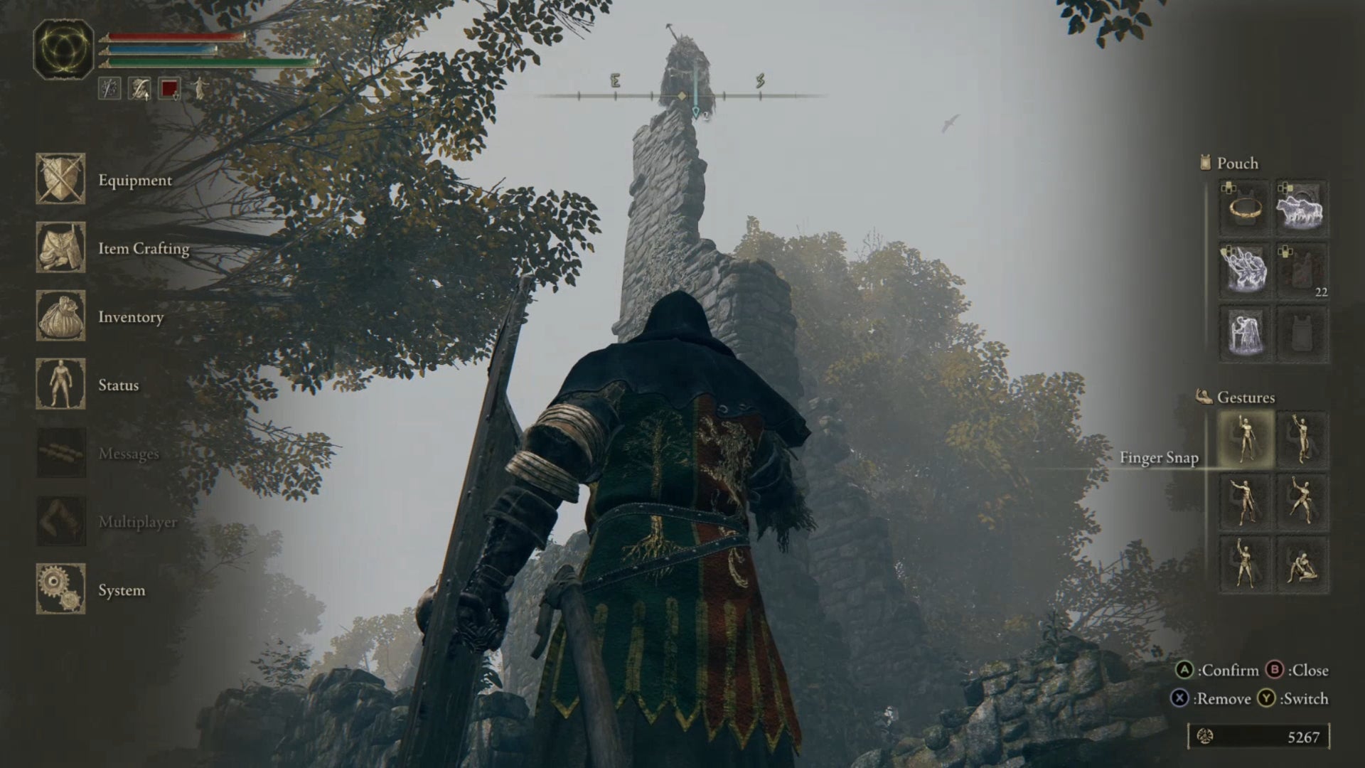 Elden Ring: the player looks up at a tower in Mistwood Ruins, upon which is perched the warrior, Blaidd the Half-Wolf. - 4