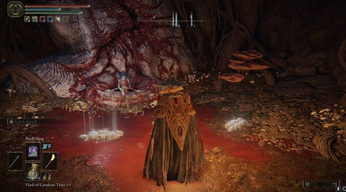 The player speaks with a blood-soaked Ranni by the Two Fingers in Elden Ring