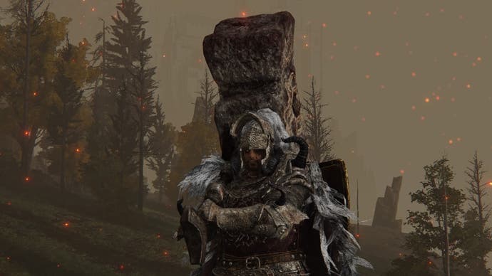 The player character holds the Giant-Crusher colossal weapon over their shoulder in Elden Ring