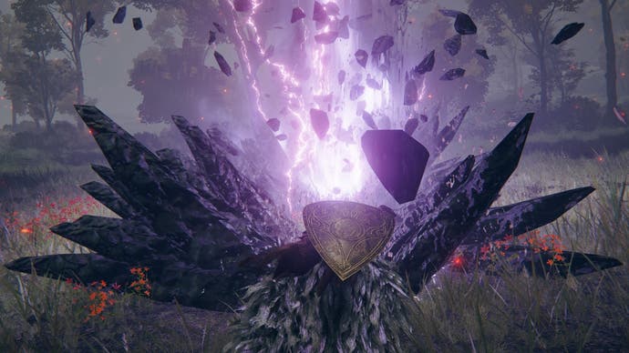 The player slams the Ruins Greatsword colossal weapon into the ground to cause a large purple explosion in Elden Ring
