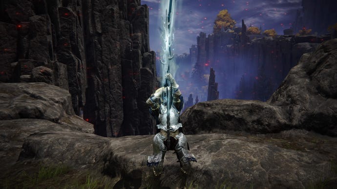 Elden Ring screenshot of the Tarnished atop a cliff, performing the Death Ritual Spear Weapon Skill.