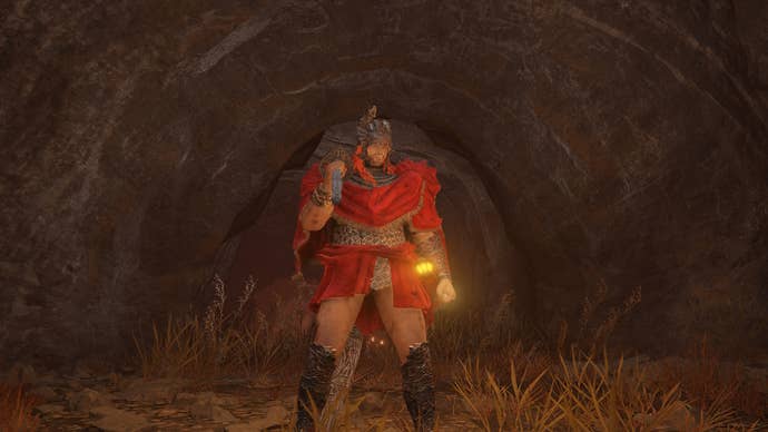 An Elden Ring Tarnished standing outside the Dragon Pit dungeon