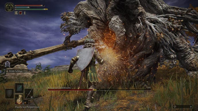 A warrior does battle with the Erdtree Avatar in Elden Ring