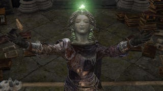 The player in Elden Ring performs the Erudition Gesture while wearing a Witch's Glintstone Crown.