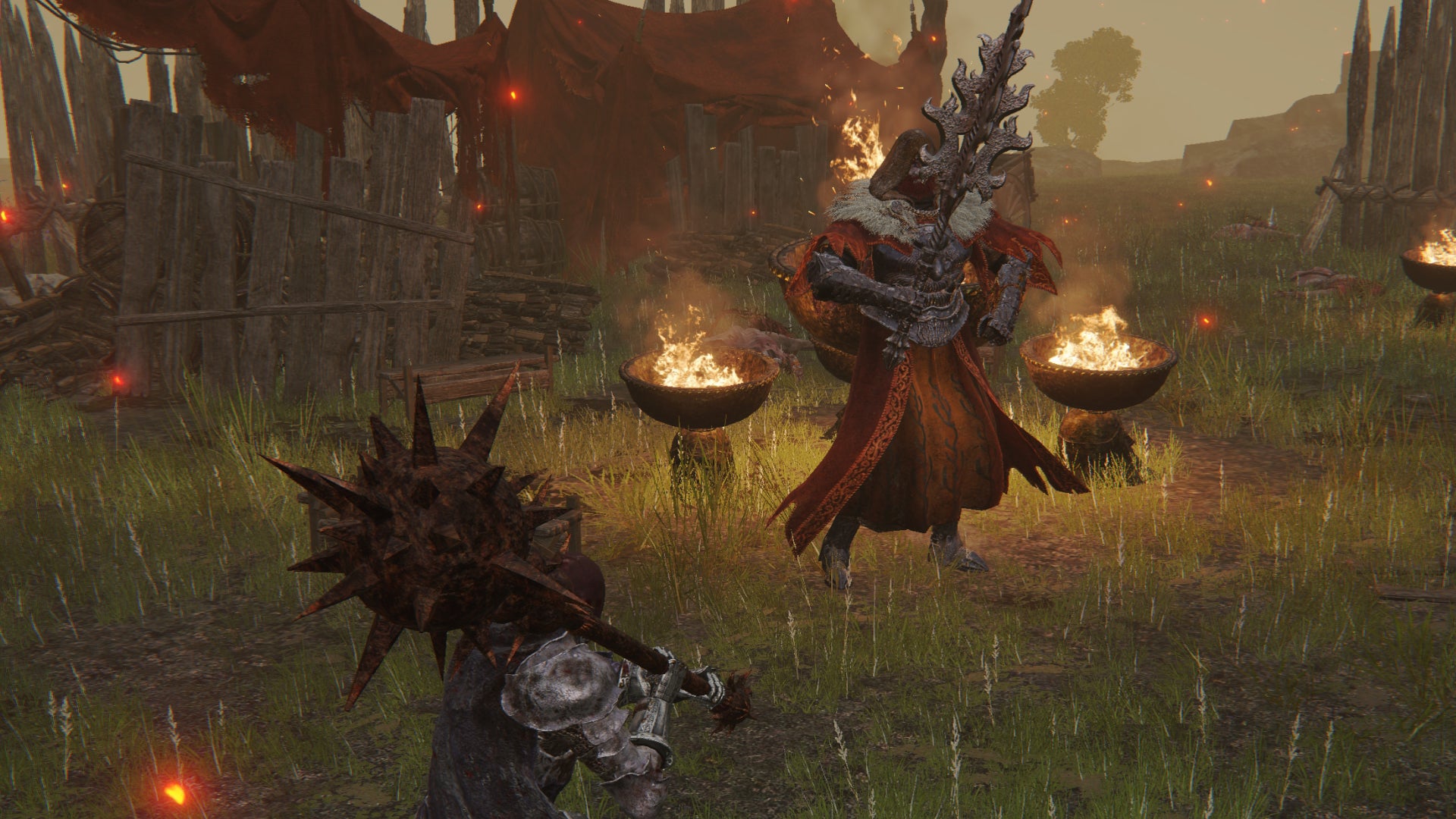 The player in Elden Ring fights a Fire Monk in their camp in Liurnia. - 3
