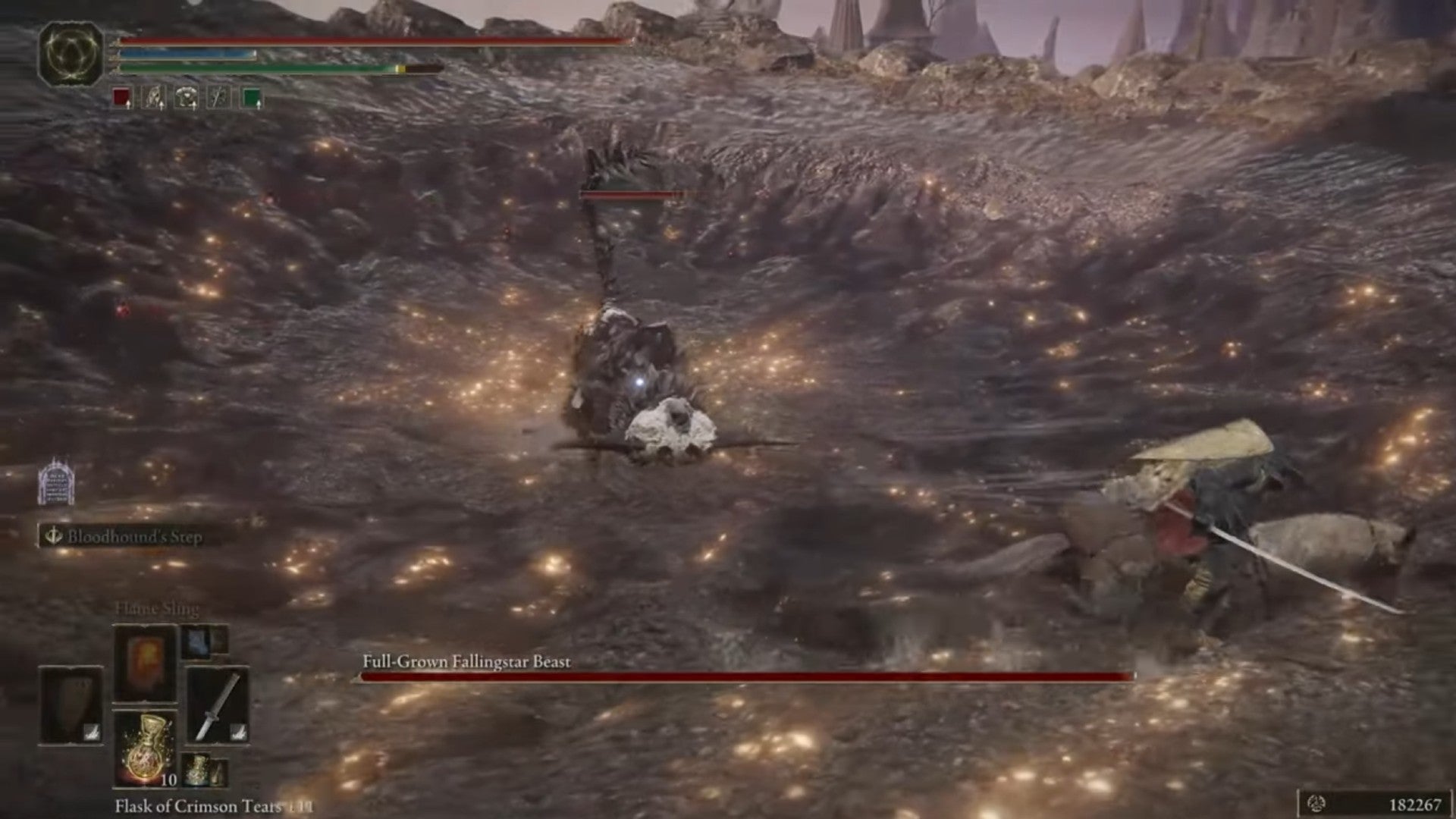 Elden Ring player uses their horse to dodge an attack from the metal bull known as the Full-Grown Fallingstar Beast. - 10