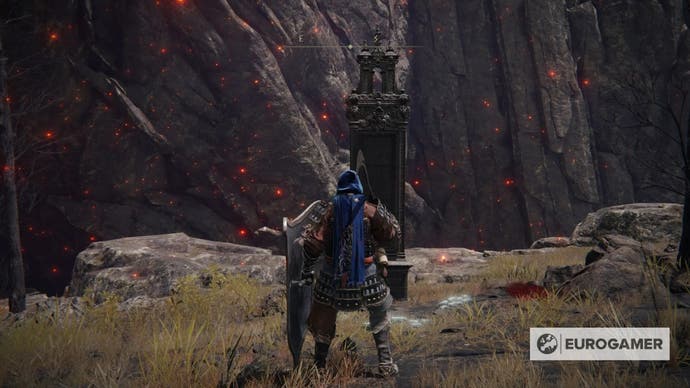 An Elden Ring character standing at the location of Gelmir's map fragment.