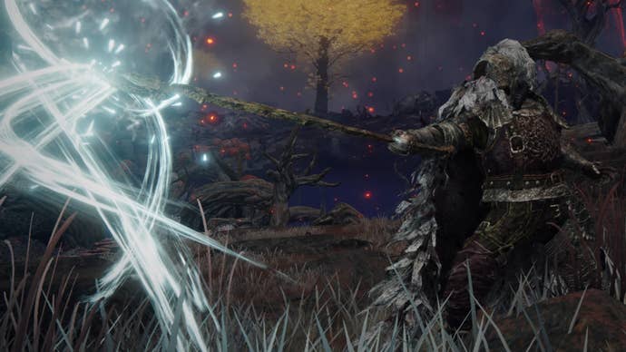 The player character casts the Ghostflame Ignition skill using the Death’s Poker greatsword in Elden Ring