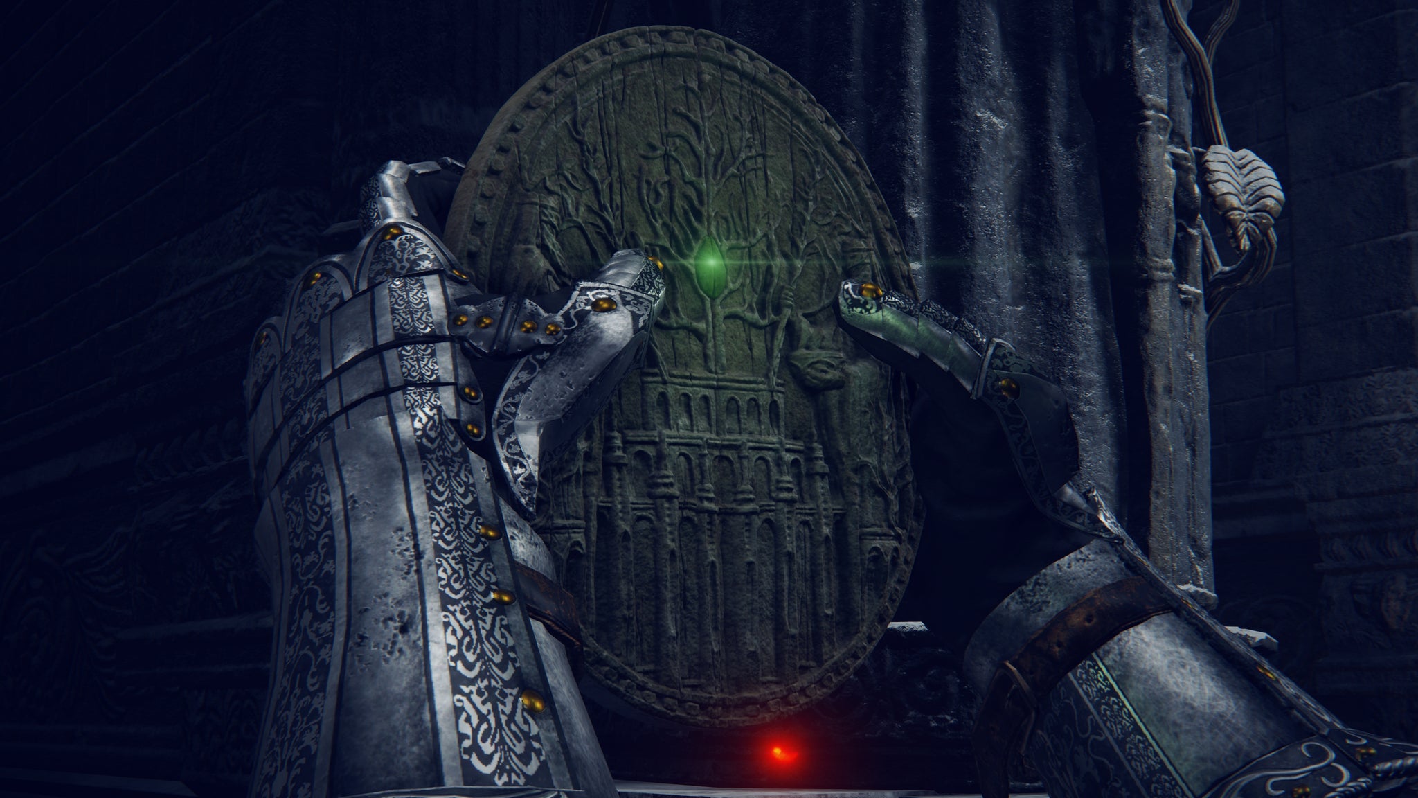 The Haligtree Medallion in Elden Ring is held by the player at the Grand Lift Of Rold. - 3