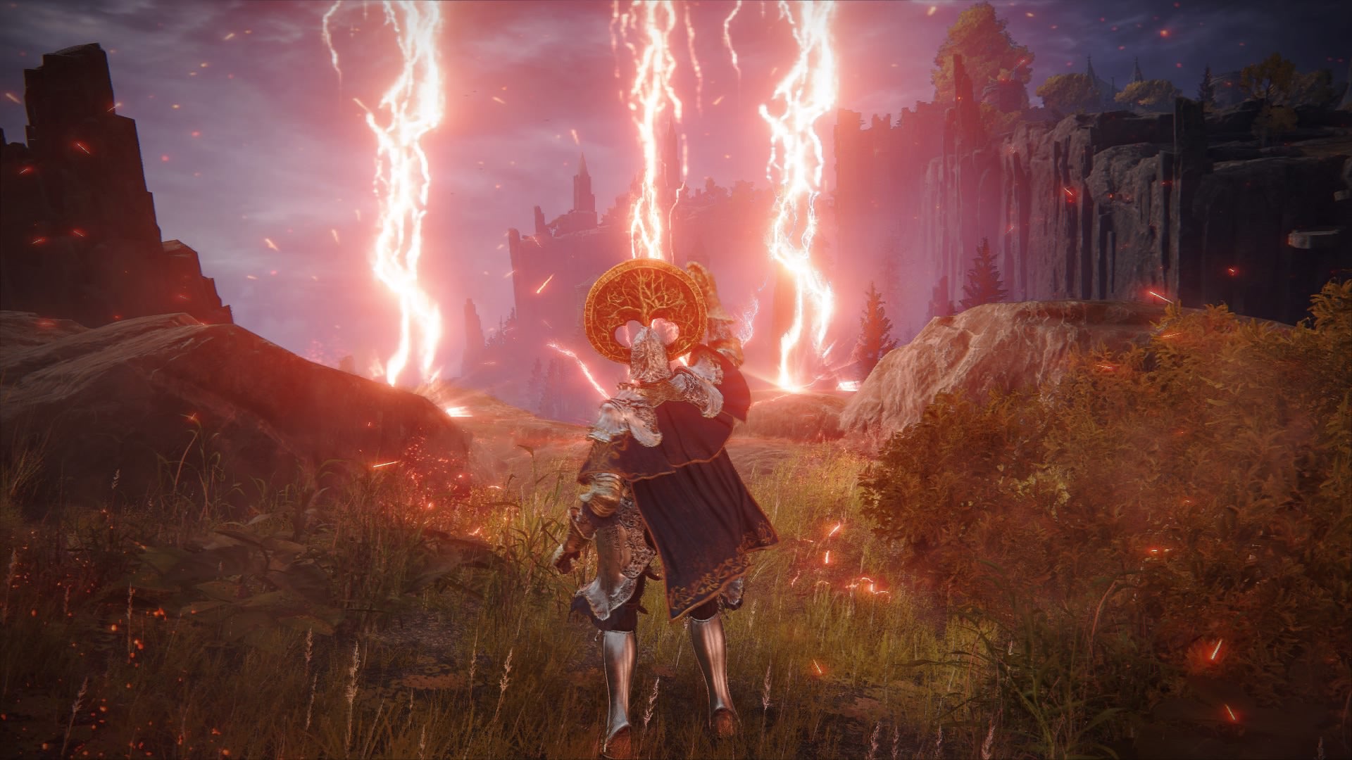 Elden Ring screenshot of the Tarnished atop a cliff, performing the Ancient Dragons' Lightning Strike Incantation.