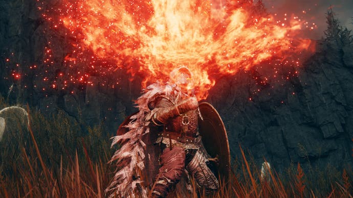 A burst of flame erupts from the player character as they cast the Catch Flame incantation in Elden Ring