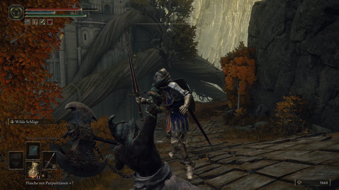A knight lifts up a warrior by their chin in Leyndell Royal Capital in Elden Ring.