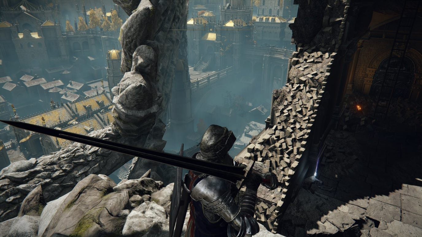 A warrior looks down at a crumbled wall in Leyndell, Royal Capital in Elden Ring.