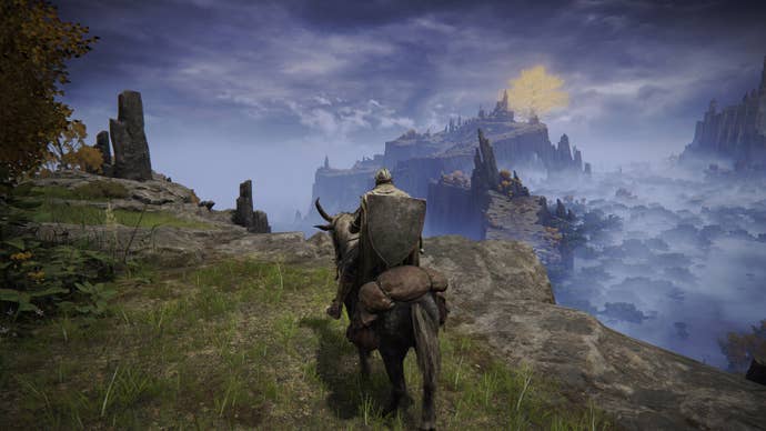 The player in Elden Ring looks out at Liurnia Of The Lakes in the distance while on horseback.