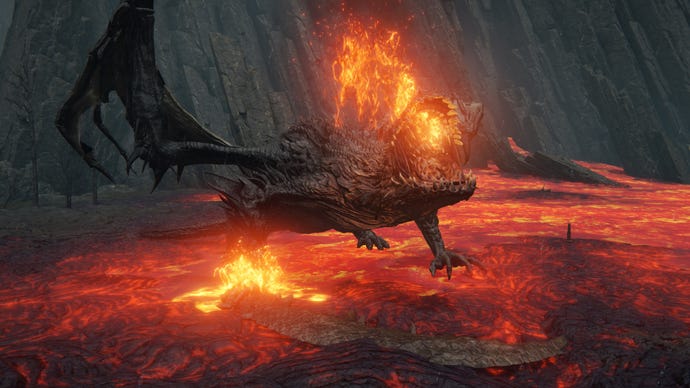 A Magma Wyrm rises out of a magma lake in Elden Ring, roaring and spewing lava.
