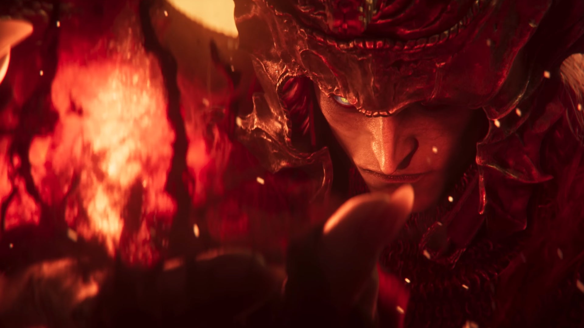 Messmer The Impaler, a main boss in Elden Ring: Shadow Of The Erdtree DLC, ignites a flame in his hand while looking closely at it. - 6