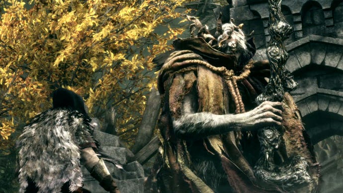 Margit, an early boss in Elden Ring, looks down at the player character.