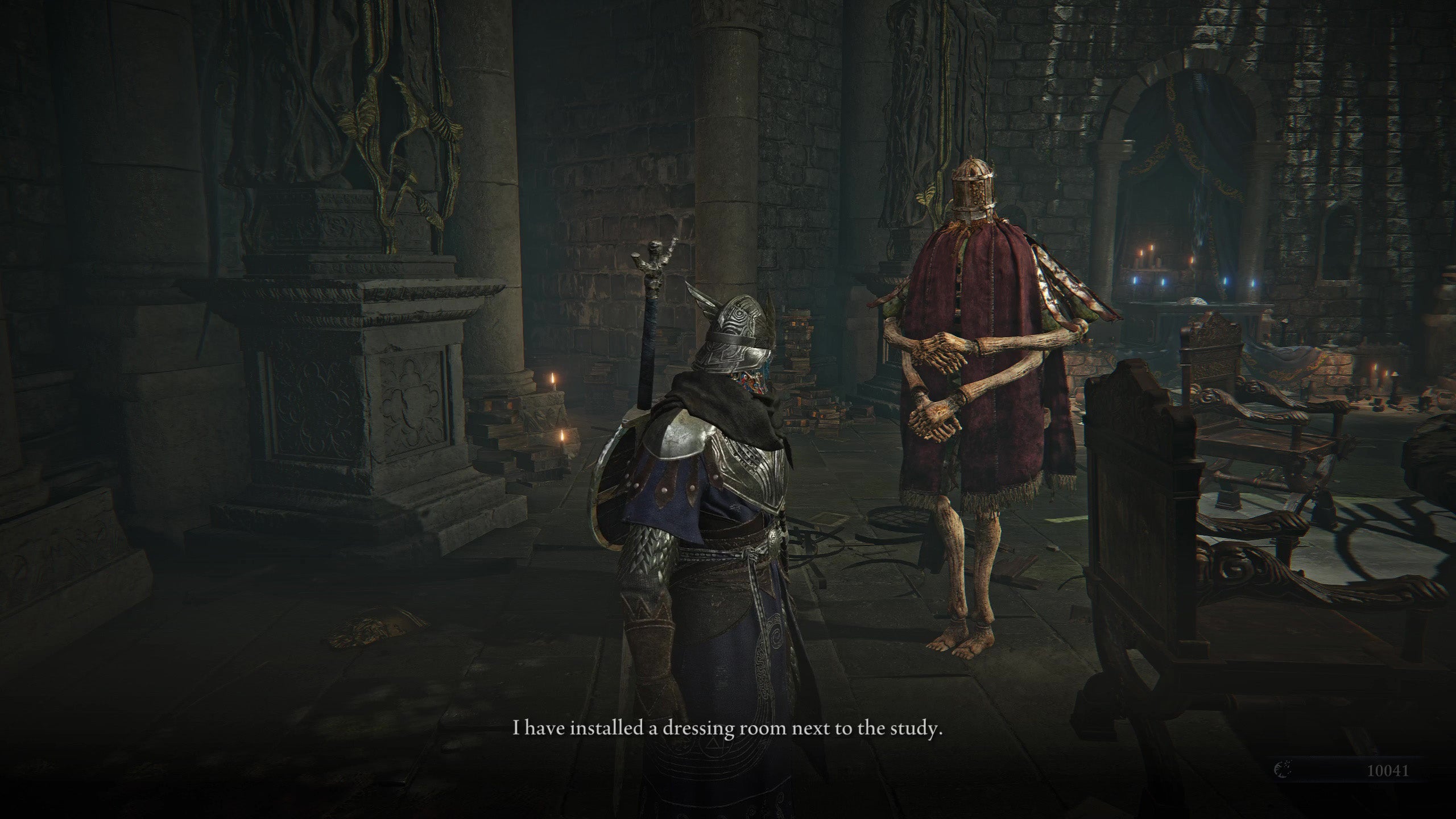 The player in Elden Ring: Nightreign speaks to the Iron Menial in the Roundtable Hold, who tells the player that they have installed a dressing room next to the study which the player can use to change their character's appearance. - 4