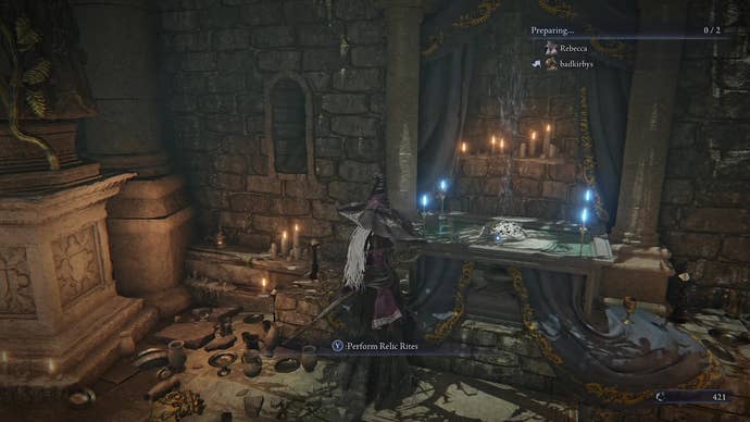 An Elden Ring Nightreign character stands in front of a stone altar dotted with blue-flamed candles and prepares to perform Relic Rites.