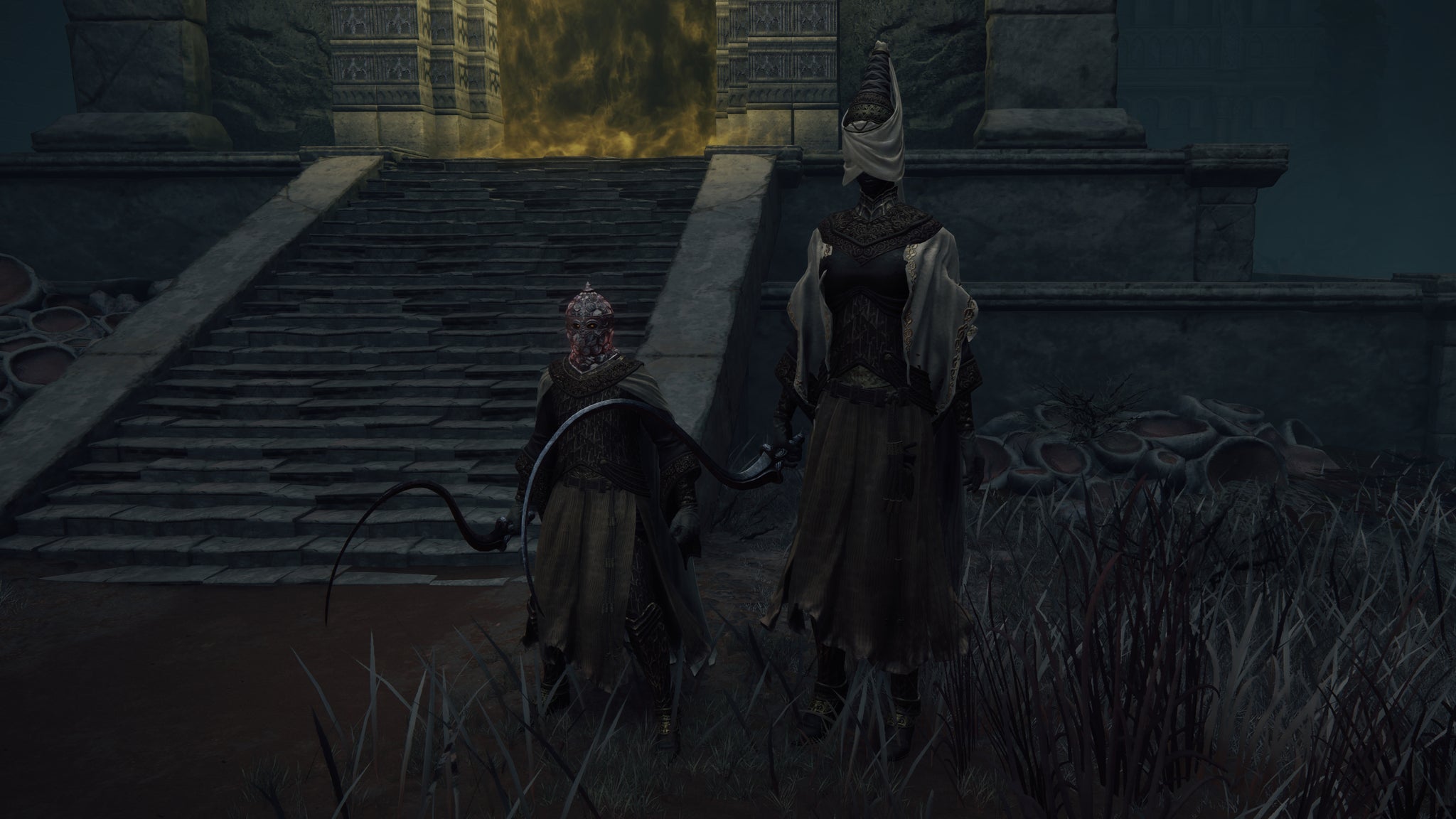 Two Nox stand side-by-side in Elden Ring, one of them wearing the Nox Mirrorhelm. - 13