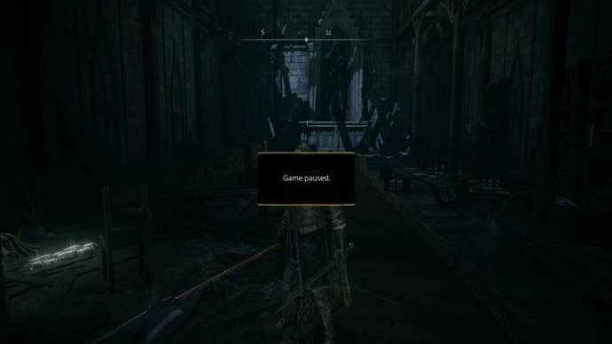 An image of the Elden Ring pause mod that shows the word “Paused” in the centre of the player’s screen.