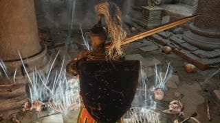 elden ring player by skeleton pile in black knife catacombs
