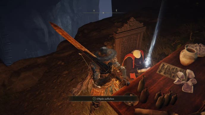 elden ring player by thops' body against a table