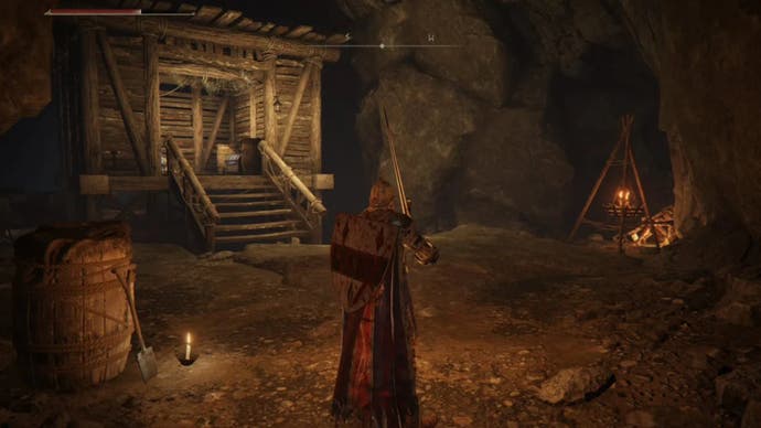elden ring player by wooden shelter inside morne tunnel