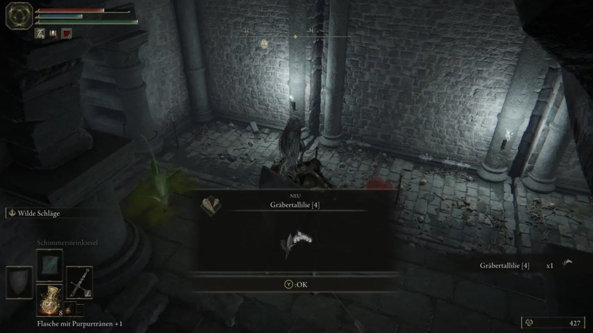 elden ring player collecting plant in black knife catacombs