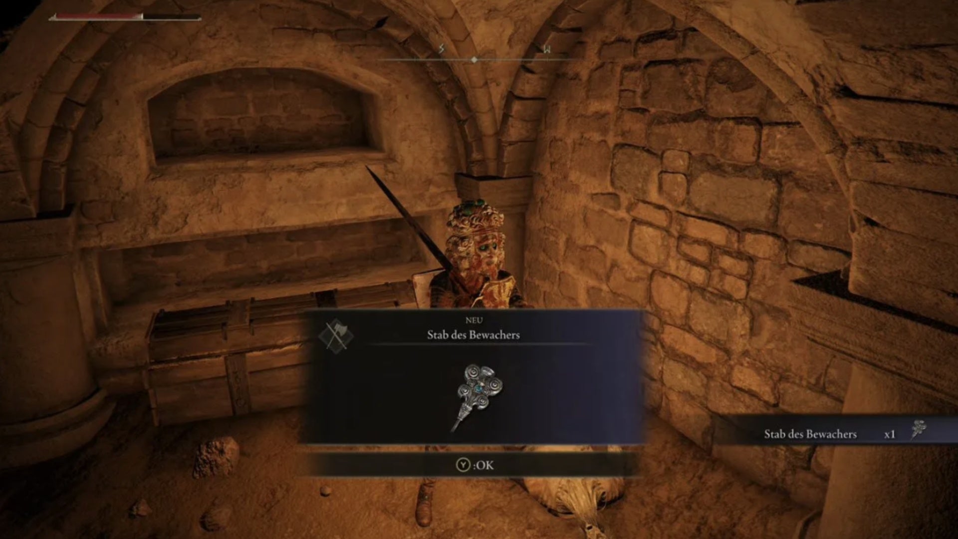 elden ring player collecting watchdogs staff in roads end catacombs