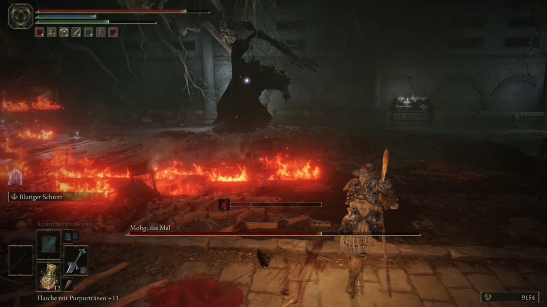 elden ring player facing mohg the omen behind a trail of fire