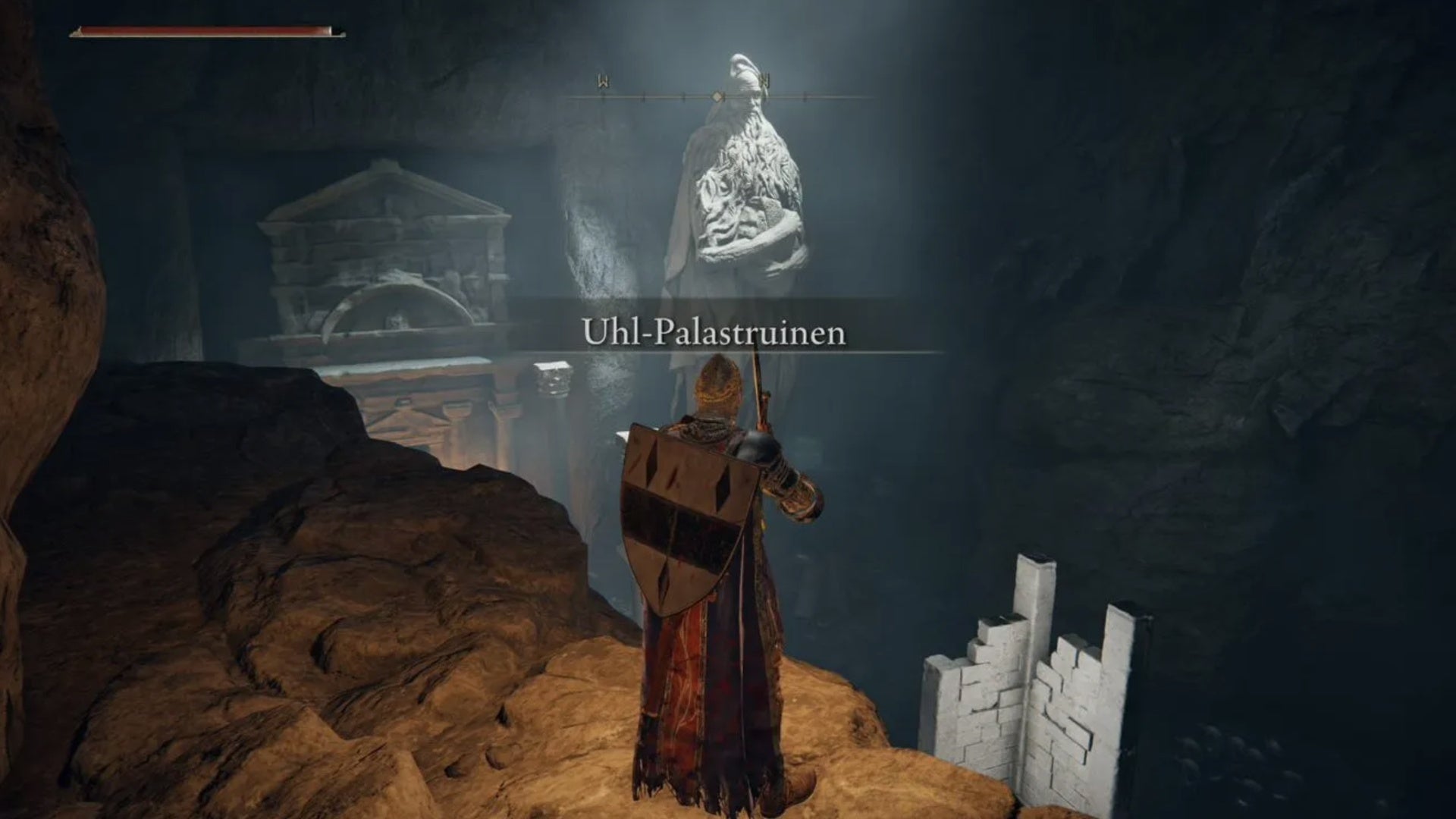 elden ring player facing statue in ainsel river area