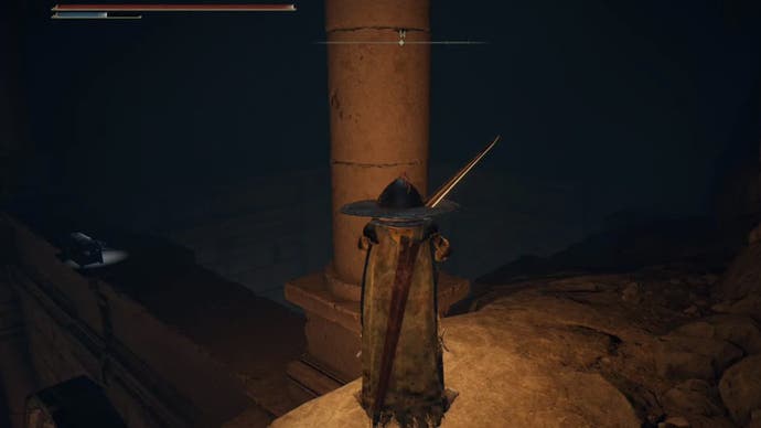elden ring player in uhl palace ruins with chest to left
