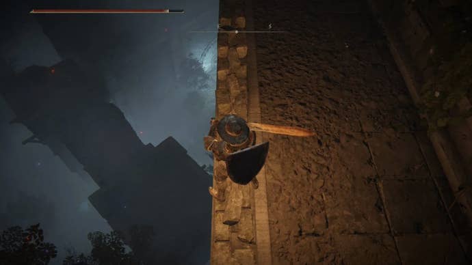 elden ring player looking down from edge at caria manor