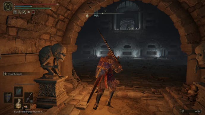 Elden Ring player near the statues in the Wyndham Catacombs