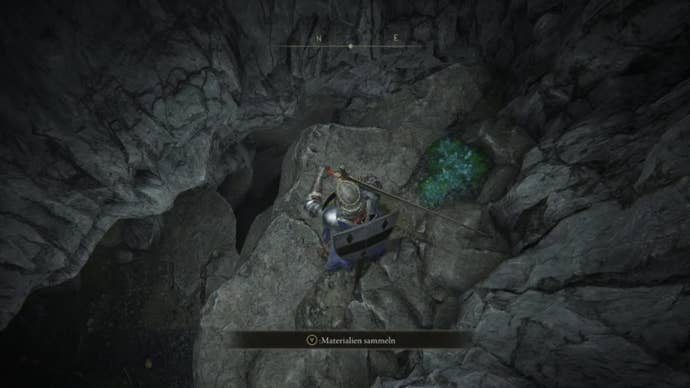 elden ring player on ledge inside dragonbarrow cave near green pile